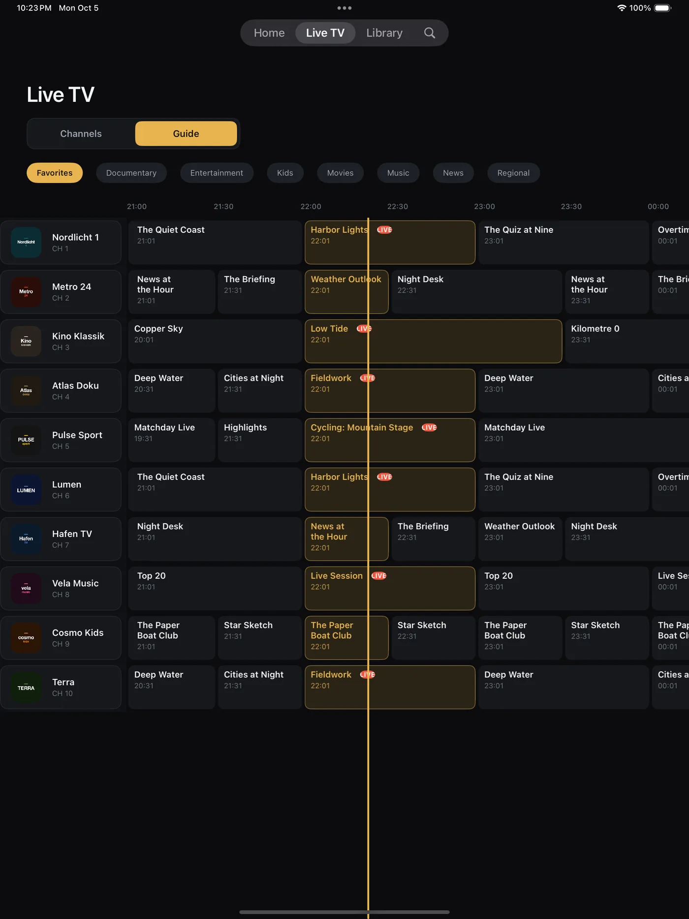 The programme guide on iPad: channels on the left, a timeline across, the programmes on air highlighted
